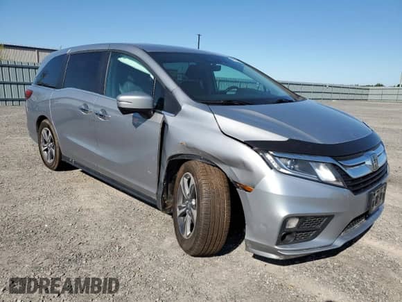 2018 Honda Odyssey with VIN 5FNRL6H42JB511561, listed as a Copart auction lot 69076135 with 139,253 mi miles and Clean title. Bid and sale history available at DreamBid. Image 4.