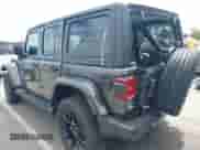 2021 Jeep Wrangler Unlimited Sahara with VIN 1C4JJXP69MW803235, listed as a IAAI auction lot 43022114 with 26,390 mi miles and . Bid and sale history available at DreamBid. Image 3.