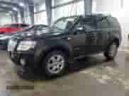 2008 Mercury Mariner Premier with VIN 4M2CU97158KJ36462, listed as a Copart auction lot 85297144 with 187,819 mi miles and Salvage title. Bid and sale history available at DreamBid. Image 1.