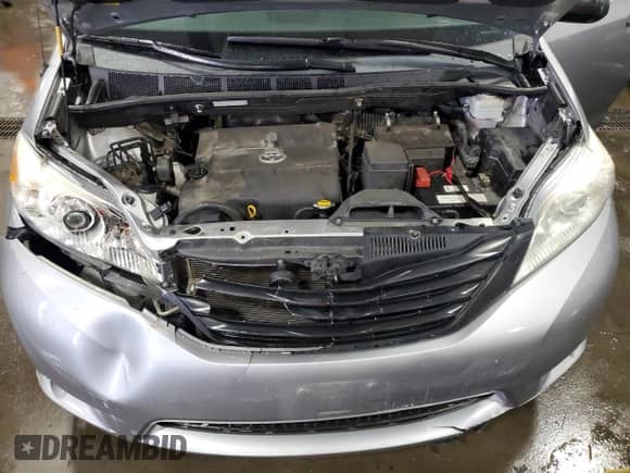2012 Toyota Sienna with VIN 5TDZK3DC3CS240569, listed as a Copart auction lot 63664415 with 129,329 mi miles and Salvage title. Bid and sale history available at DreamBid. Image 12.