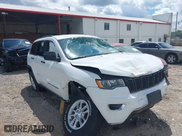 2020 Jeep Grand Cherokee Laredo E with VIN 1C4RJFAG4LC143667, listed as a IAAI auction lot 42847717 with 51,387 mi miles and . Bid and sale history available at DreamBid. Image 6.