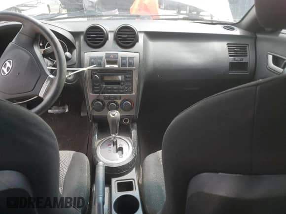 2004 Hyundai Tiburon GT с VIN KMHHN65F54U112744, выставлен на аукционе Copart как лот 57850495 с пробегом 103 409 миль миль и Списание • Salvage title. История ставок и продаж доступна на DreamBid. Изображение 8.