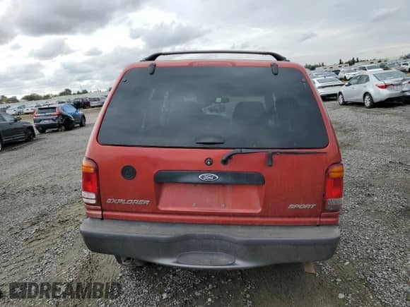 1998 Ford Explorer Sport с VIN 1FMYU24E9WUB90001, выставлен на аукционе Copart как лот 84812255 с пробегом 225 970 миль миль и Списание • Salvage title. История ставок и продаж доступна на DreamBid. Изображение 6.