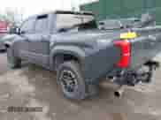 2024 Toyota Tacoma SR5 with VIN 3TYLB5JN1RT039046, listed as a IAAI auction lot 41610499 with 6,455 mi miles and . Bid and sale history available at DreamBid. Image 3.