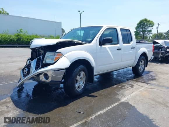 2007 Nissan Frontier LE with VIN 1N6AD07W37C448659, listed as a IAAI auction lot 42074001 with 159,403 mi miles and . Bid and sale history available at DreamBid. Image 17.