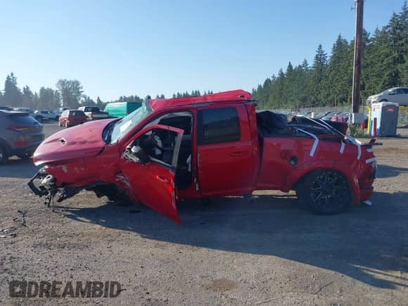 2014 Ram 1500 Sport with VIN 1C6RR7HT8ES162014, listed as a IAAI auction lot 43282022 with Not provided miles and . Bid and sale history available at DreamBid. Image 13.