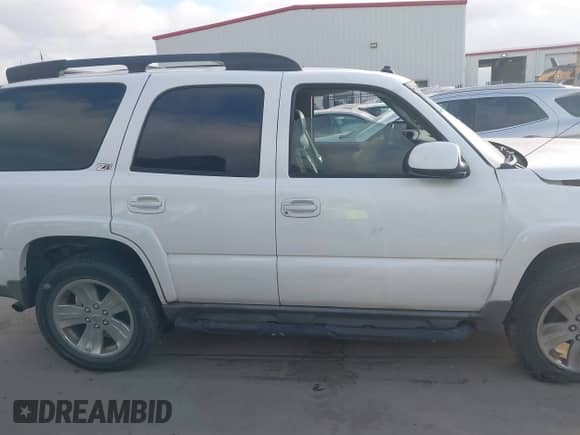 2003 Chevrolet Tahoe Z71 with VIN 1GNEK13Z93R309635, listed as a IAAI auction lot 43486449 with 297,003 mi miles and . Bid and sale history available at DreamBid. Image 14.