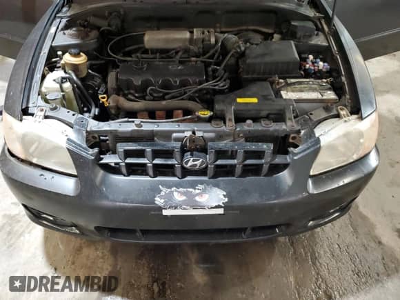 2000 Hyundai Accent with VIN KMHCG45G9YU127156, listed as a Copart auction lot 63414815 with 91,446 mi miles and Clean title. Bid and sale history available at DreamBid. Image 11.