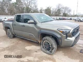 2024 Toyota Tacoma SR5 with VIN 3TMLB5JN2RM044896, listed as a IAAI auction lot 41575173 with 4,293 mi miles and . Bid and sale history available at DreamBid. Image 1.