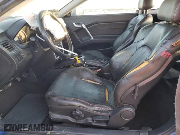 2005 Hyundai Tiburon GT with VIN KMHHN65F35U186438, listed as a Copart auction lot 41879955 with 152,574 mi miles and Salvage title. Bid and sale history available at DreamBid. Image 7.