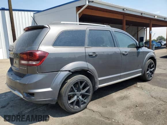 2015 Dodge Journey Crossroad с VIN 3C4PDCGB0FT719840, выставлен на аукционе Copart как лот 69299535 с пробегом 124 046 миль миль и Списание • Salvage title. История ставок и продаж доступна на DreamBid. Изображение 3.