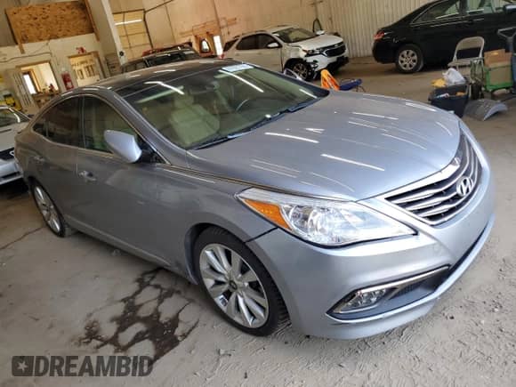 2015 Hyundai Azera Limited с VIN KMHFH4JG2FA483964, выставлен на аукционе Copart как лот 81921795 с пробегом 125 208 миль миль и Списание • Salvage title. История ставок и продаж доступна на DreamBid. Изображение 4.