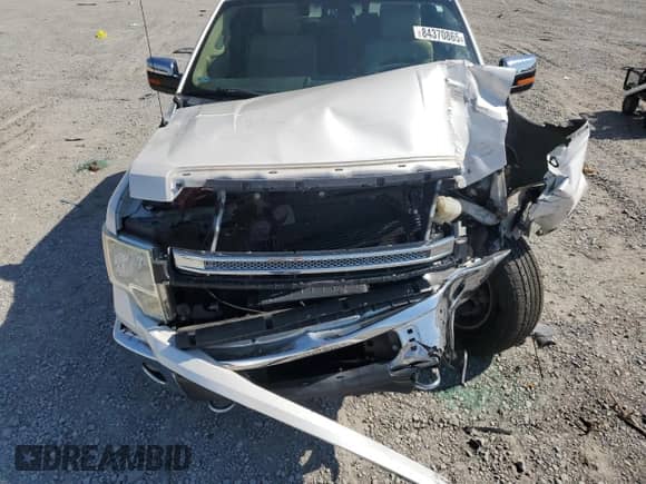 2013 Ford F-150 Lariat z VIN 1FTFW1ET9DKD16055, wystawiony jako Copart lot #84370865 z przebiegiem Nie podano mil oraz Szkoda całkowita • Salvage title. Historia ofert i sprzedaży dostępna na DreamBid. Obrazek 11.