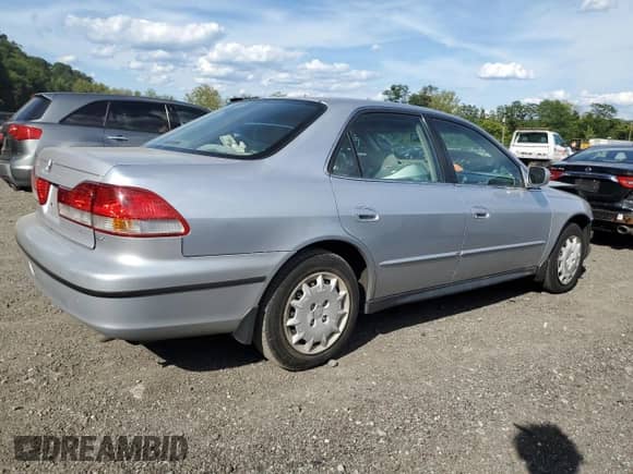 2001 Honda Accord LX with VIN 1HGCG66531A124744, listed as a Copart auction lot 70809655 with 81,927 mi miles and Salvage title. Bid and sale history available at DreamBid. Image 3.