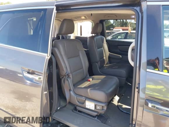 2015 Honda Odyssey Touring Elite with VIN 5FNRL5H99FB024645, listed as a IAAI auction lot 43302037 with 220,472 mi miles and . Bid and sale history available at DreamBid. Image 8.