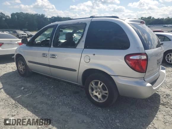 2004 Dodge Caravan SXT with VIN 1D4GP45R64B569005, listed as a Copart auction lot 64564485 with 118,809 mi miles and Salvage title. Bid and sale history available at DreamBid. Image 2.