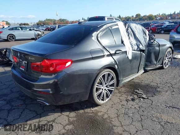 2017 BMW 5 Series 540i with VIN WBAJE5C34HG915409, listed as a IAAI auction lot 43583967 with 69,713 mi miles and . Bid and sale history available at DreamBid. Image 4.