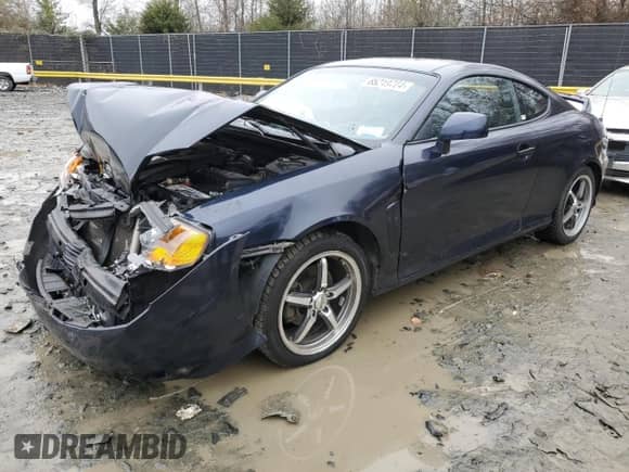2004 Hyundai Tiburon GT с VIN KMHHN65F34U127906, выставлен на аукционе Copart как лот 85219724 с пробегом 98 585 миль миль и Чистый • Clean title. История ставок и продаж доступна на DreamBid. Изображение 1.