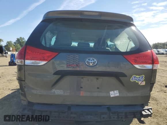 2012 Toyota Sienna with VIN 5TDZK3DC4CS184450, listed as a Copart auction lot 71284385 with 207,878 mi miles and Salvage title. Bid and sale history available at DreamBid. Image 6.