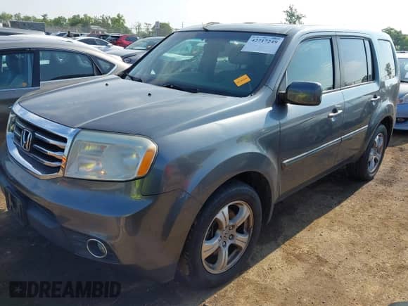 2013 Honda Pilot EX-L with VIN 5FNYF4H63DB029713, listed as a IAAI auction lot 42717249 with 175,787 mi miles and . Bid and sale history available at DreamBid. Image 2.