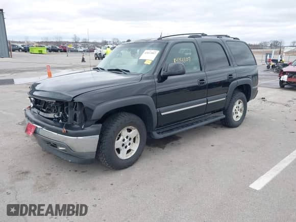 2005 Chevrolet Tahoe LS with VIN 1GNEK13TX5J179510, listed as a IAAI auction lot 41833007 with 192,402 mi miles and . Bid and sale history available at DreamBid. Image 2.
