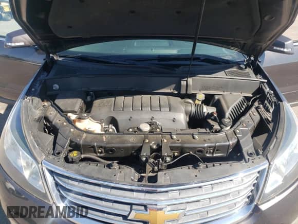 2013 Chevrolet Traverse LT с VIN 1GNKVGKD9DJ261895, выставлен на аукционе Copart как лот 81309205 с пробегом 166 231 миль миль и Списание • Salvage title. История ставок и продаж доступна на DreamBid. Изображение 12.
