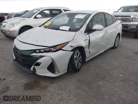 2018 Toyota Prius Plus z VIN JTDKARFP0J3084142, wystawiony jako IAAI lot #41936736 z przebiegiem 50 699 mil mil oraz . Historia ofert i sprzedaży dostępna na DreamBid. Obrazek 19.