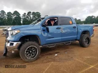 2020 Toyota Tundra SR5 with VIN 5TFEY5F17LX257440, listed as a Copart auction lot 64581425 with 92,134 mi miles and Salvage title. Bid and sale history available at DreamBid. Image 1.