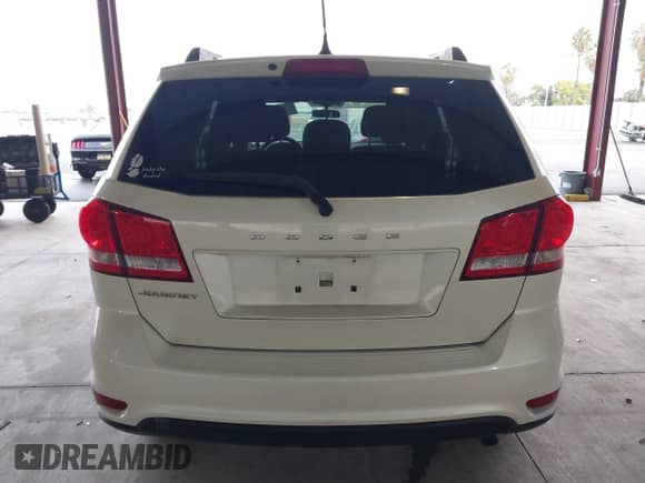 2013 Dodge Journey SXT with VIN 3C4PDCBB3DT661615, listed as a IAAI auction lot 43455375 with 99,763 mi miles and . Bid and sale history available at DreamBid. Image 16.