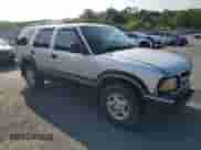 1995 Chevrolet Blazer z VIN 1GNDT13W6S2171395, wystawiony jako Copart lot #65632595 z przebiegiem 156 605 mil mil oraz Szkoda całkowita • Salvage title. Historia ofert i sprzedaży dostępna na DreamBid. Obrazek 4.
