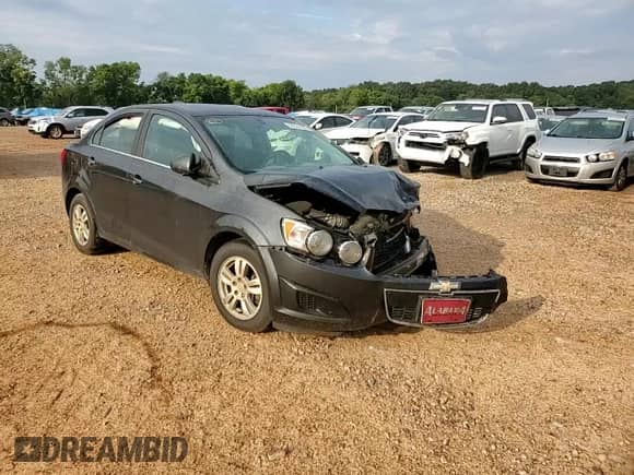 2016 Chevrolet Sonic LT z VIN 1G1JC5SB8G4179164, wystawiony jako Copart lot #68324365 z przebiegiem 124 800 mil mil oraz Szkoda całkowita • Salvage title. Historia ofert i sprzedaży dostępna na DreamBid. Obrazek 13.