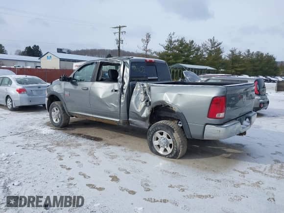 2010 Dodge 2500 ST with VIN 3D7TT2CT6AG145603, listed as a IAAI auction lot 41627159 with 220,135 mi miles and . Bid and sale history available at DreamBid. Image 3.