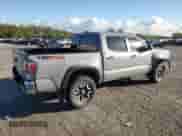 2021 Toyota Tacoma SR with VIN 3TMCZ5AN1MM425739, listed as a Copart auction lot 84917565 with 77,559 mi miles and Clean title. Bid and sale history available at DreamBid. Image 3.