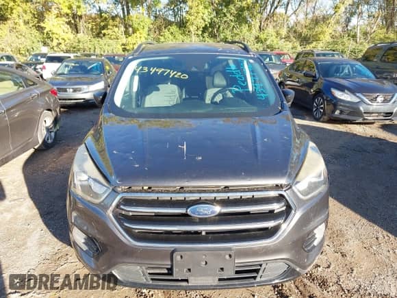 2018 Ford Escape SE z VIN 1FMCU9GD5JUB12944, wystawiony jako IAAI lot #43497420 z przebiegiem 172 518 mil mil oraz . Historia ofert i sprzedaży dostępna na DreamBid. Obrazek 12.