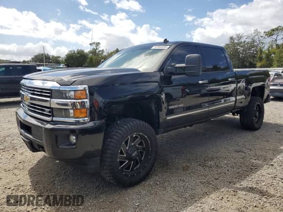 2015 Chevrolet Silverado 2500HD LTZ с VIN 1GC1KWE8XFF195563, выставлен на аукционе Copart как лот 83994095 с пробегом 196 008 миль миль и Списание • Salvage title. История ставок и продаж доступна на DreamBid. Изображение 1.