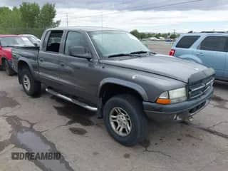 2003 Dodge Dakota Sport with VIN 1D7HG38N53S273174, listed as a IAAI auction lot 42872040 with 148,408 mi miles and . Bid and sale history available at DreamBid. Image 1.