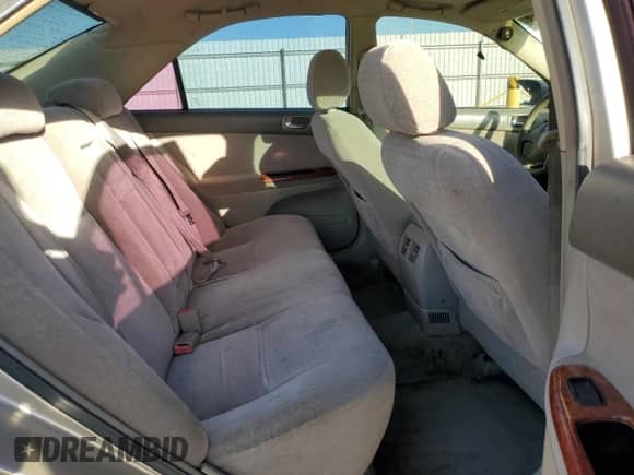 2004 Toyota Camry LE z VIN JTDBE32K140255496, wystawiony jako Copart lot #83874805 z przebiegiem 287 349 mil mil oraz Szkoda całkowita • Salvage title. Historia ofert i sprzedaży dostępna na DreamBid. Obrazek 10.