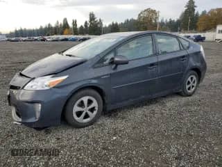2015 Toyota Prius Two z VIN JTDKN3DU5F0450647, wystawiony jako Copart lot #82698115 z przebiegiem 179 250 mil mil oraz Szkoda całkowita • Salvage title. Historia ofert i sprzedaży dostępna na DreamBid. Obrazek 1.