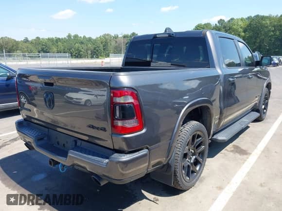 2021 Ram 1500 Laramie z VIN 1C6SRFJT3MN581701, wystawiony jako IAAI lot #43136993 z przebiegiem 96 977 mil mil oraz . Historia ofert i sprzedaży dostępna na DreamBid. Obrazek 4.