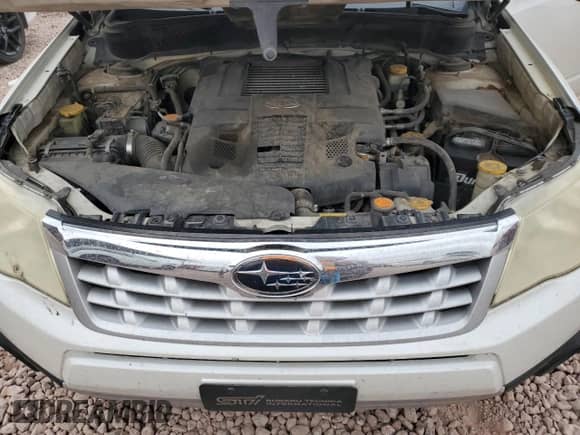 2012 Subaru Forester XT Touring z VIN JF2SHGGC9CH434936, wystawiony jako Copart lot #41658945 z przebiegiem 220 955 mil mil oraz Czysty tytuł • Clean title. Historia ofert i sprzedaży dostępna na DreamBid. Obrazek 12.