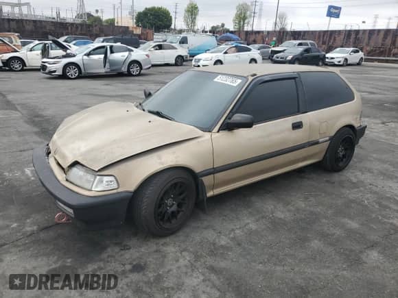 1990 Honda Civic with VIN 2HGED6343LH555344, listed as a Copart auction lot 51232765 with 217,533 mi miles and Salvage title. Bid and sale history available at DreamBid. Image 1.