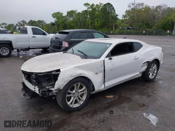 2021 Chevrolet Camaro 1LT с VIN 1G1FB1RX4M0142120, выставлен на аукционе IAAI как лот 41394658 с пробегом 25 477 миль миль и . История ставок и продаж доступна на DreamBid. Изображение 2.
