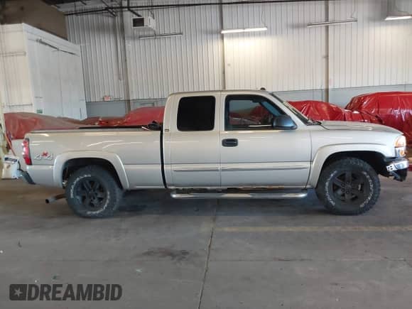 2004 GMC Sierra 1500 SLE with VIN 2GTEK19T941364026, listed as a IAAI auction lot 42985577 with 168,480 mi miles and . Bid and sale history available at DreamBid. Image 14.
