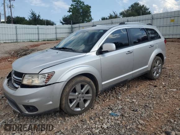 2012 Dodge Journey Crew with VIN 3C4PDDDG7CT224584, listed as a Copart auction lot 80711255 with 143,861 mi miles and Salvage title. Bid and sale history available at DreamBid. Image 1.