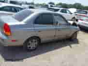 2005 Hyundai Accent GLS z VIN KMHCG45C55U608336, wystawiony jako IAAI lot #42743218 z przebiegiem 221 254 mil mil oraz . Historia ofert i sprzedaży dostępna na DreamBid. Obrazek 4.