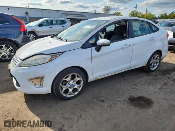 2012 Ford Fiesta SEL with VIN 3FADP4CJ2CM171333, listed as a Copart auction lot 71777635 with 117,504 mi miles and Salvage title. Bid and sale history available at DreamBid. Image 1.