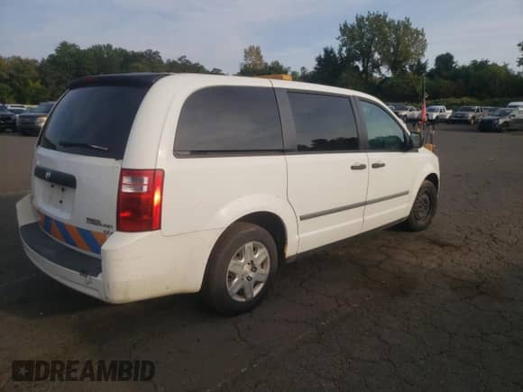2010 Dodge Grand Caravan Cargo with VIN 2D4RN1AE6AR497042, listed as a Copart auction lot 71733084 with 174,555 mi miles and Salvage title. Bid and sale history available at DreamBid. Image 3.