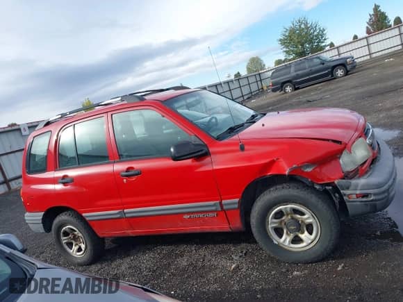 2002 Chevrolet Tracker with VIN 2CNBJ13C726908601, listed as a IAAI auction lot 43432764 with 117,301 mi miles and . Bid and sale history available at DreamBid. Image 13.