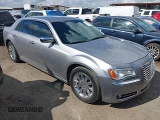 2014 Chrysler 300 C with VIN 2C3CCAETXEH109067, listed as a IAAI auction lot 42596910 with 150,337 mi miles and . Bid and sale history available at DreamBid. Image 1.