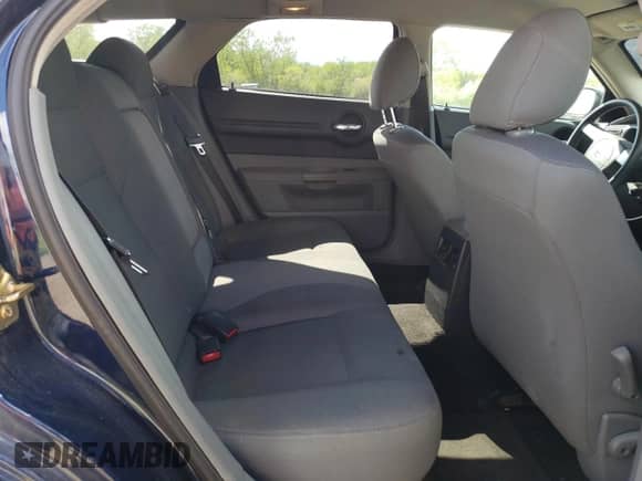 2005 Dodge Magnum SXT with VIN 2D4GZ48V05H688812, listed as a Copart auction lot 57261475 with 146,633 mi miles and Salvage title. Bid and sale history available at DreamBid. Image 10.